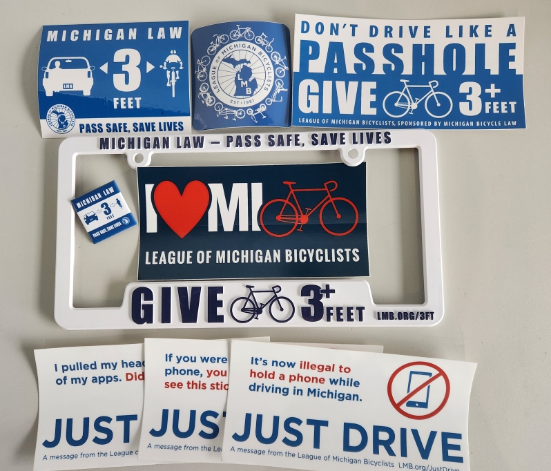 Product Description: Help spread the word about Michigan'sSafe Passing law with a license plate cover, stickers, and pin. Get one for you, the whole family or even the club! (Bulk pricing discount- YAY!)</br> Safe Passing License Plate Surround, stickers, pin